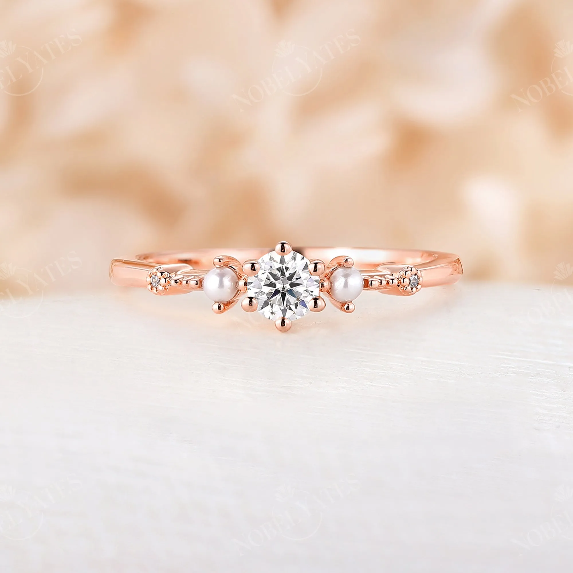 Dainty Moissanite & Pearl Engagement Ring Side Stones