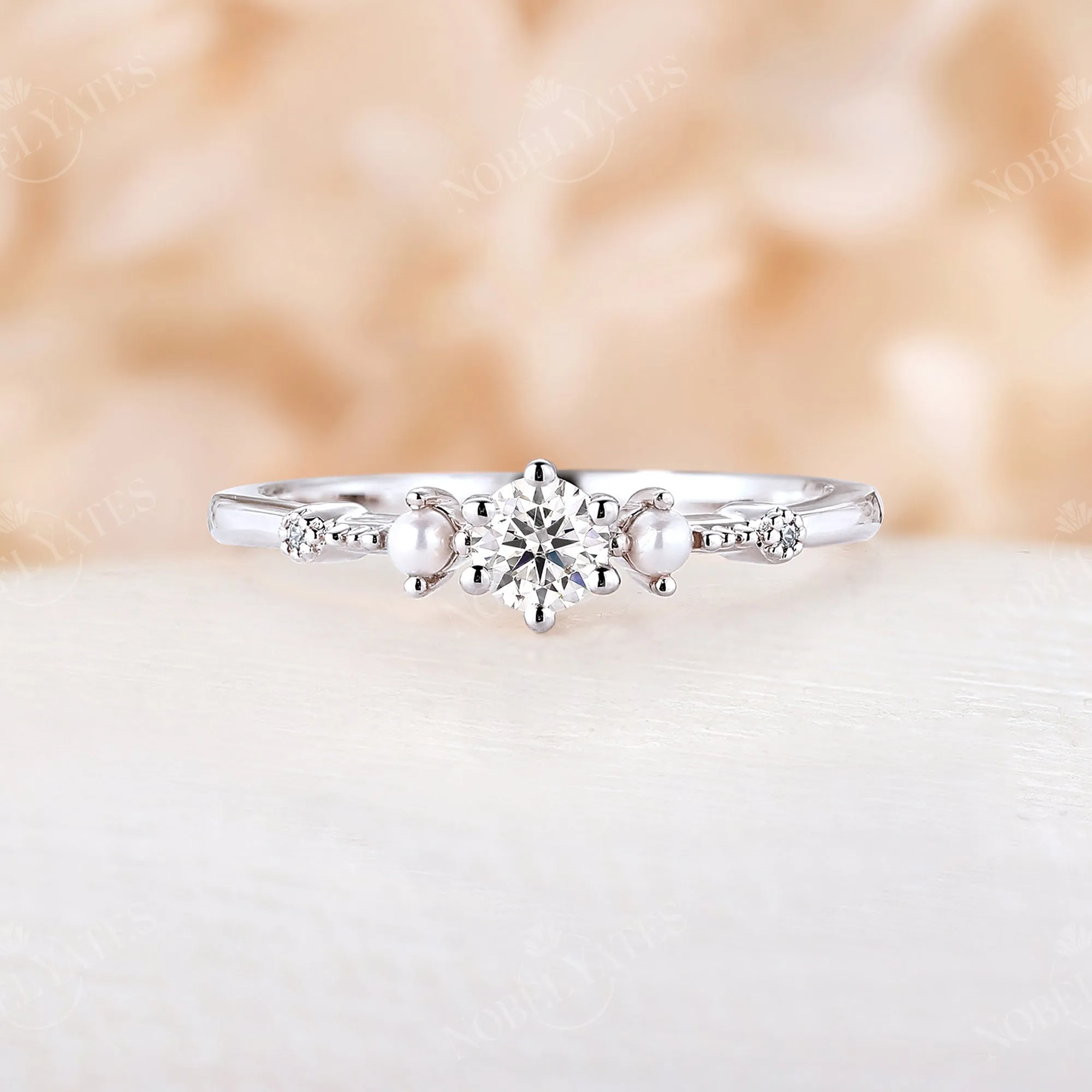 Dainty Moissanite & Pearl Engagement Ring Side Stones