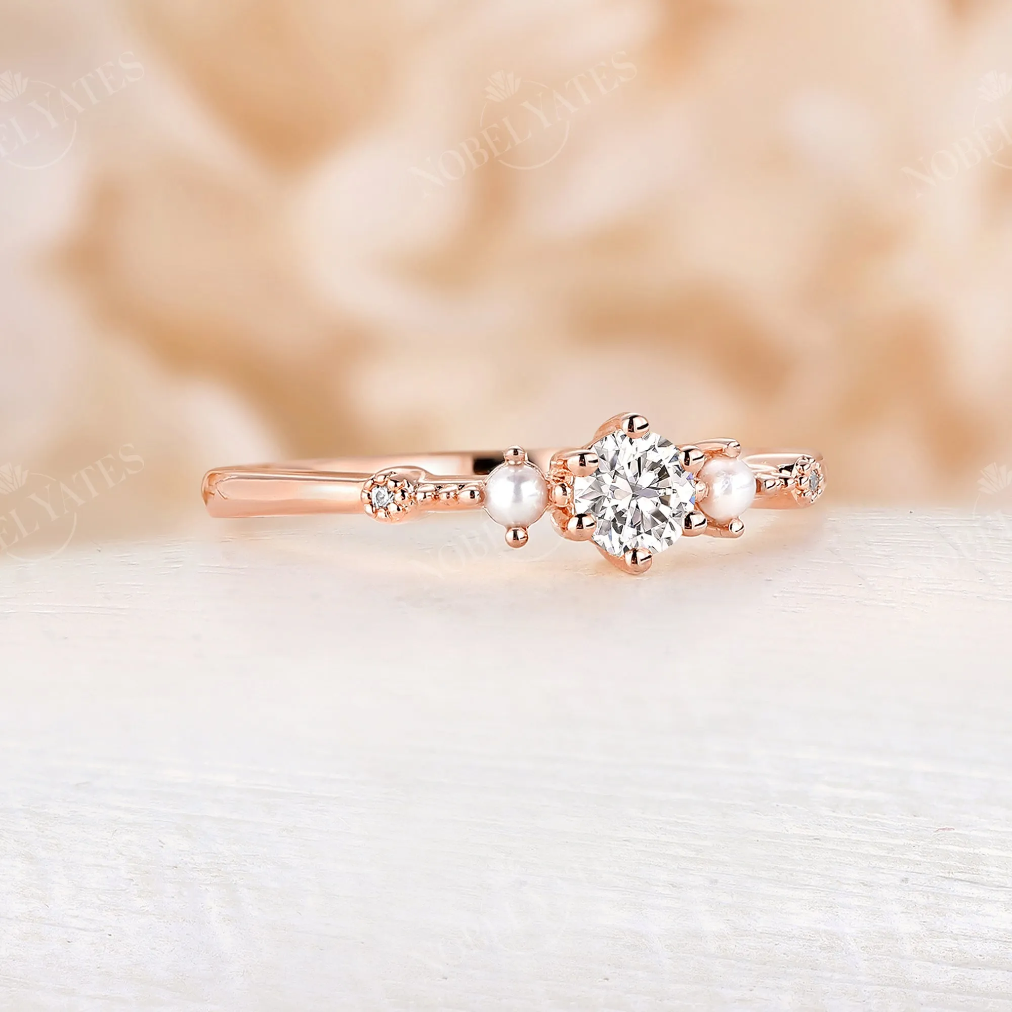 Dainty Moissanite & Pearl Engagement Ring Side Stones