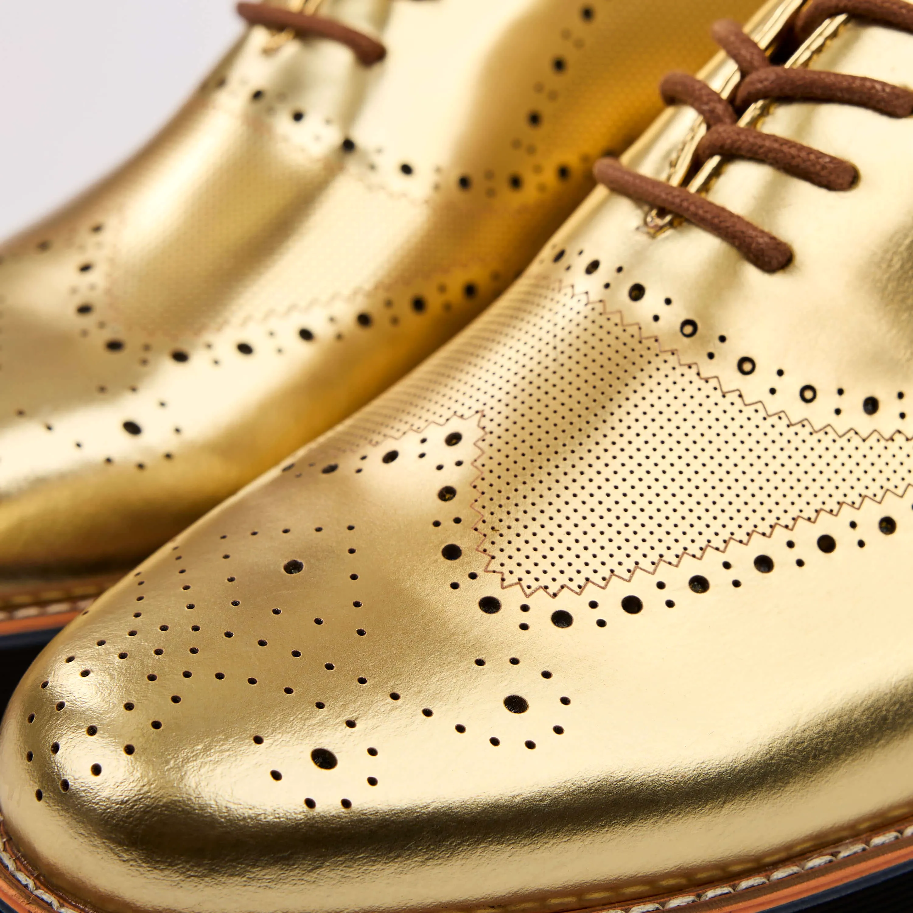 Oscar Gold Patent Leather Wholecut Brogue Sneakers